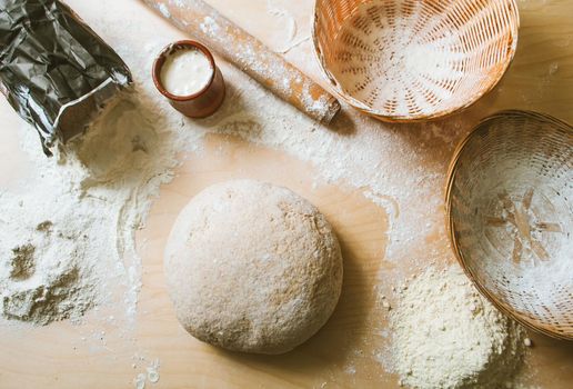 Dough from wholegrain flour and fermented yeast. View from above