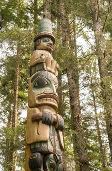 Sitka, AK - 8 June 2022: Totem poles displayed in the Sitka National Historical park in Alaska