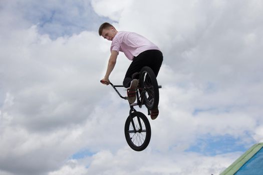 Belarus, Gomel, June 24, 2018. Central park. Extreme cycling.Dangerous tricks on an extreme bike