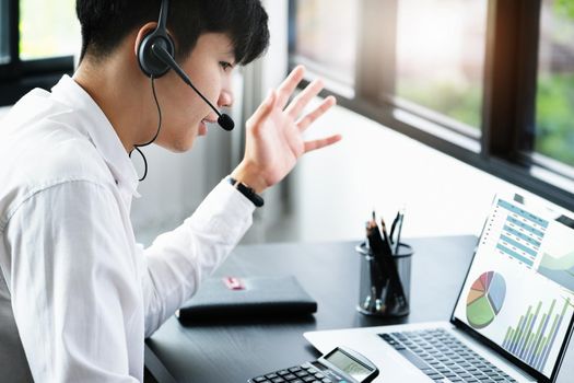 The young businessman is conference With people who work with using computer to check financial statements at home instead of working in the office