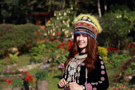 Traditionally dressed Mhong hill tribe woman in the garden at mountain