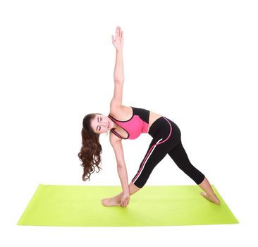 Young woman doing yoga exercise with yoga mat isolated on white background