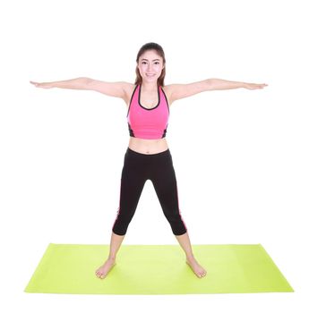 Young woman doing yoga exercise with yoga mat isolated on white background