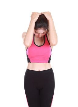 Young woman doing yoga exercise with yoga mat isolated on white background