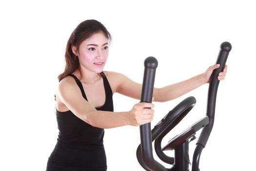 young woman doing exercises with exercise machine, on white background