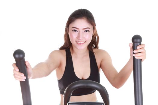 young woman doing exercises with exercise machine, on white background