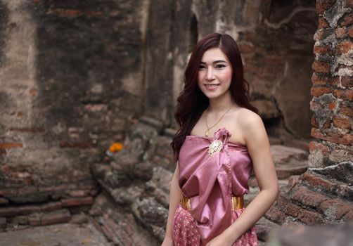 Female in Thai traditional dress at  historical park