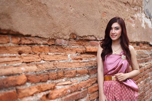 Female in Thai traditional dress at  historical park