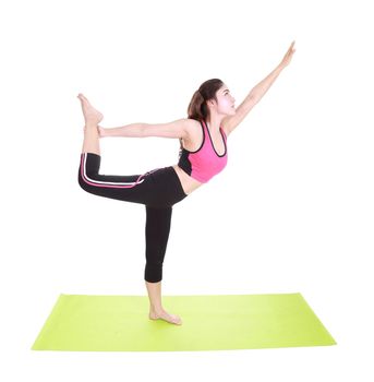 Young woman doing yoga exercise with yoga mat isolated on white background