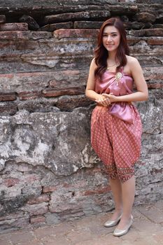 Female in Thai traditional dress at  historical park