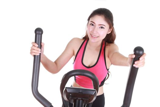 young woman doing exercises with exercise machine, on white background