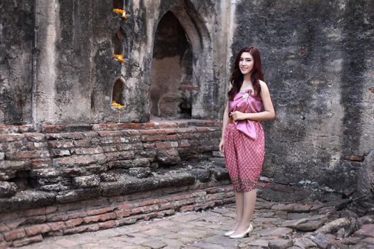 Female in Thai traditional dress at  historical park