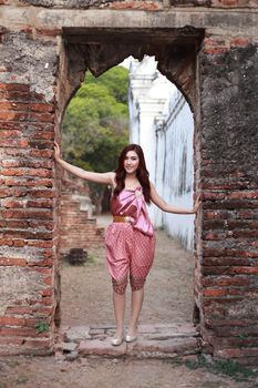 Female in Thai traditional dress at  historical park