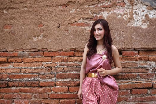 Female in Thai traditional dress at  historical park