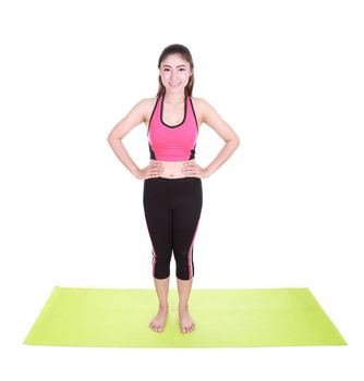 Young woman doing yoga exercise with yoga mat isolated on white background