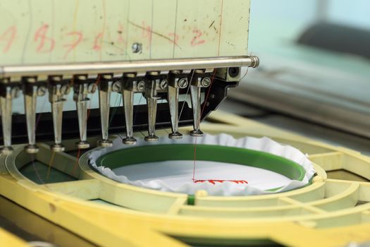 closed-up of Machine embroidery is an embroidery process whereby a sewing machine