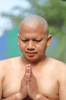 Male who will be monk shaving hair for be Ordained to new monk