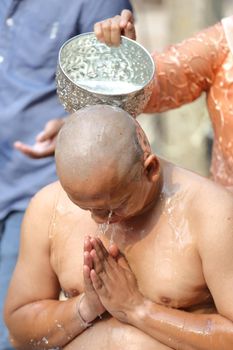 Male who will be monk shaving hair for be Ordained to new monk