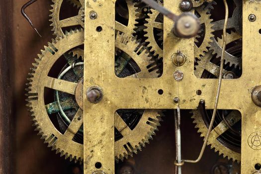Close up view of vintage clock's gears