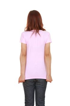 female with blank pink t-shirt (back side) isolated on white background