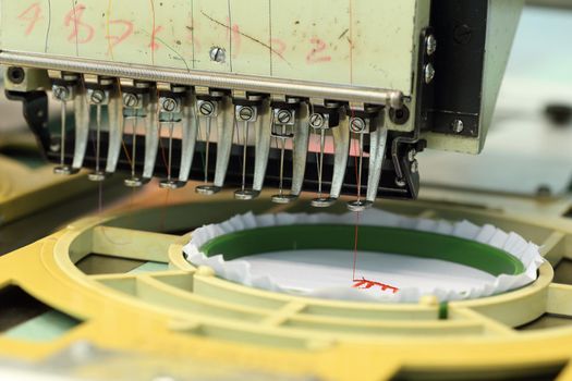 closed-up of Machine embroidery is an embroidery process whereby a sewing machine