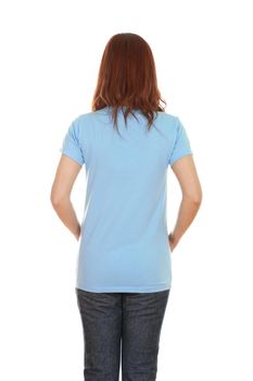 female with blank blue t-shirt (back side) isolated on white background