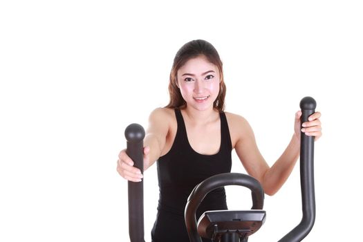 young woman doing exercises with exercise machine, on white background