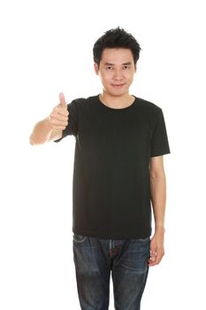 man in blank black t-shirt with thumbs up isolated on white background