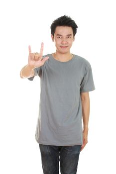 man in gray t-shirt with hand sign I love you isolated on white background