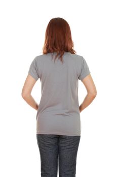 female with blank gray t-shirt (back side) isolated on white background