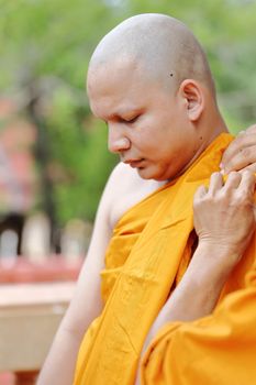 the ordination ceremony that change the Thai young men to be the new monks