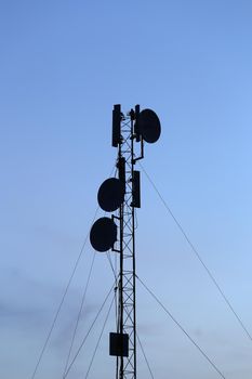 silhouette mobile antenna tower, or silhouette telephone communication tower