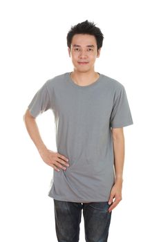 man with blank gray t-shirt isolated on white background