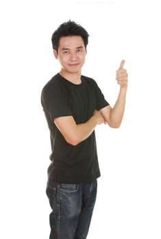 man in blank black t-shirt with thumbs up isolated on white background