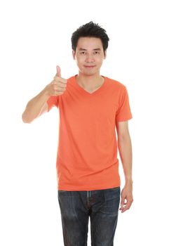 man in blank orange t-shirt with thumbs up isolated on white background