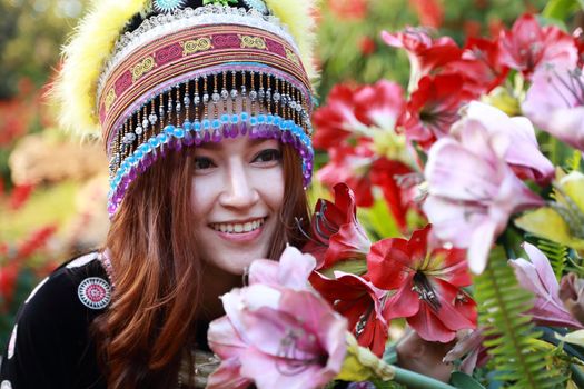 Traditionally dressed Mhong hill tribe woman in the garden at mountain