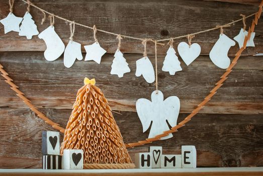 rustic styled new year tree made from pasta and wooden decoration