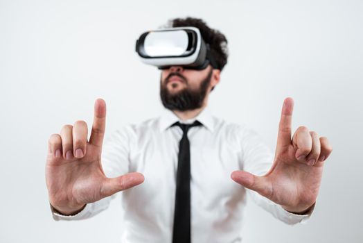 Man Wearing Vr Glasses And Presenting Important Messages Between Hands.