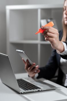 Businesswoman Holding Phone And Pointing With Marker On Important News.