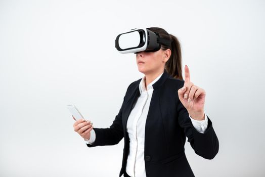 Woman Holding Mobile Phone, Wearing Vr Glasses And Pointing On New Idea.