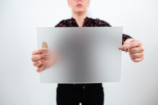 Woman Pointing At Placard And Presenting New Ideas For Marketing.