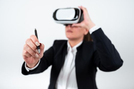 Woman Wearing Vr Glasses And Pointing On Recent Updates With Pen.