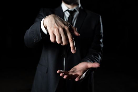 Businessman Pointing Important Infortmations With One Finger.