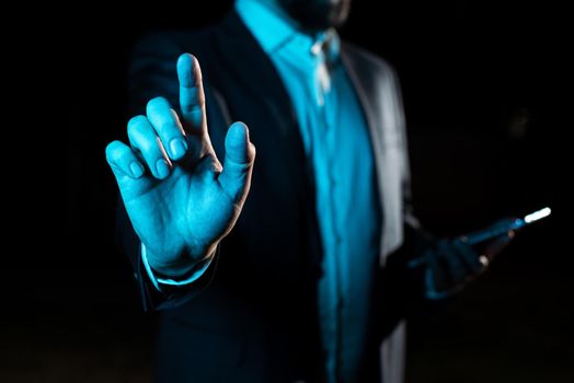 Businessman Pointing Important Infortmations With One Finger.