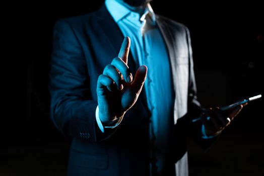 Businessman Pointing Important Infortmations With One Finger.