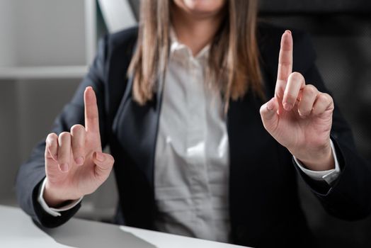 Businesswoman Pointing With Two Fingers On Important Messages.