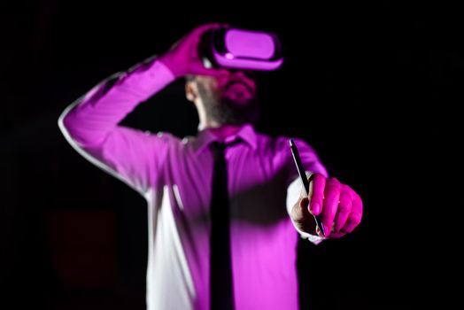 Man Holding Pen During Professional Training Through Virtual Reality.