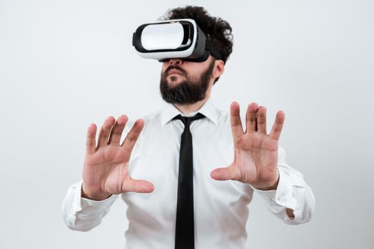 Man Wearing Vr Glasses And Presenting Important Messages Between Hands.