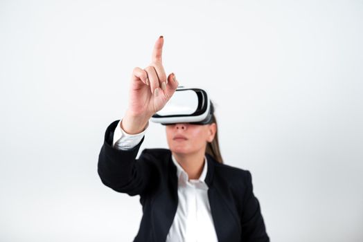 Woman Wearing Vr Glasses And Pointing On Important Message With One Finger.