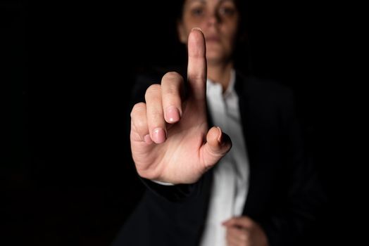 Businesswoman Pointing Important Infortmations With One Finger.